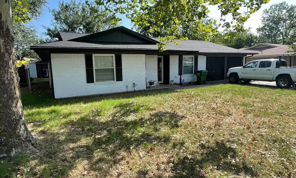 Professional roofing crew working on a residential roof in Nocatee